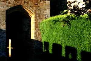 Late evening shadows on gatehouse. Photograph &copy; P Fiennes