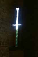 Inside the gatehouse, the narrow slits would have been used by archers. Photograph &copy; P Fiennes